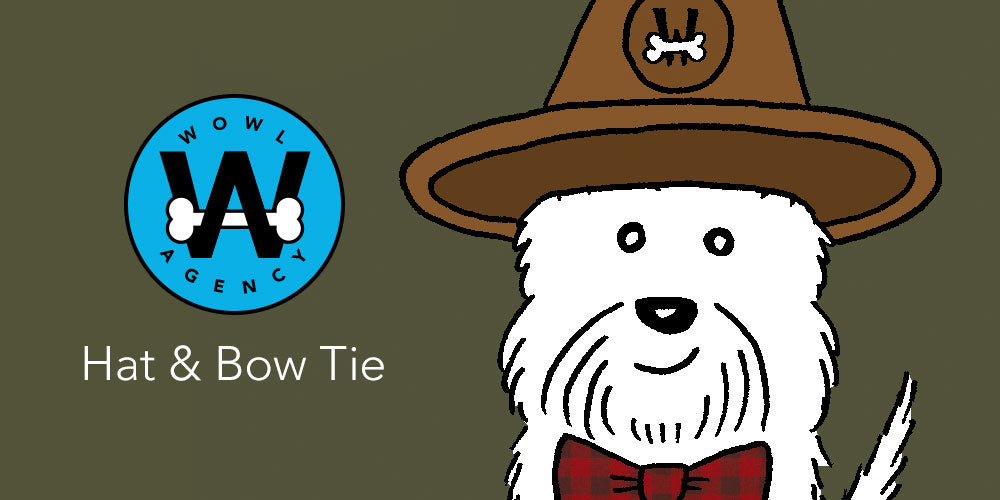 Casper looking dapper with a Fedora hat and bow tie